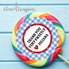 Load image into Gallery viewer, Gingham and Glitter Mini and Jumbo swirl pop party favors. Inspired by the Wizard of oz, Label is deigned with scalloped edges, a blue and white gingham boarder, and a white center outlined in red glitter. Pops are personalized with your custom message.