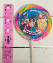 Load image into Gallery viewer, Example photo of the jumbo size swirl pop, provided with a ruler for reference
