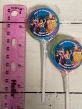 Load image into Gallery viewer, Example photo of the mini size swirl pop, provided with a ruler for reference

